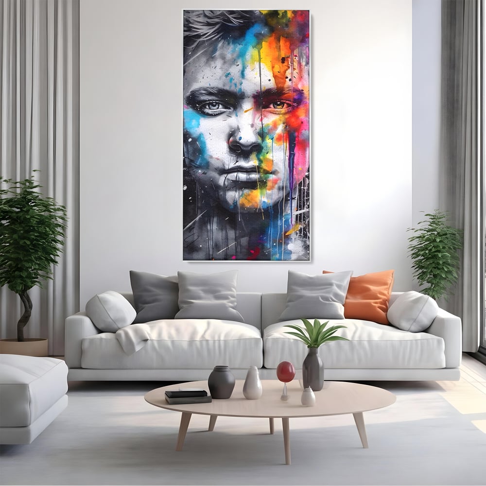 Tablou canvas cu tablou canvas portret barbat cu pete de culoare, in rama de aluminiu argintiu, pe perete intr-un living